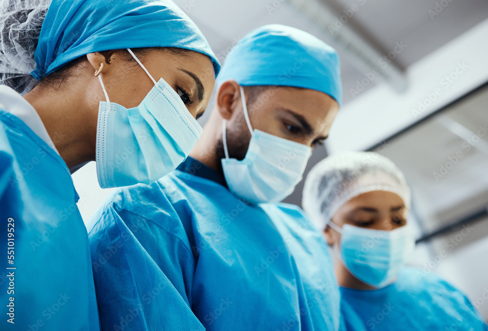 Mask, staff and surgery for medical in hospital, healthcare and emergency room for diagnosis. Doctor, nurse and team support, recovery and heart failure procedure for patient, face cover and hygiene. Mask, staff and surgery for medical in hospital, healthcare and emergency room for diagnosis. Doctor, nurse and team support, recovery and heart failure procedure for patient, face cover and hygiene.