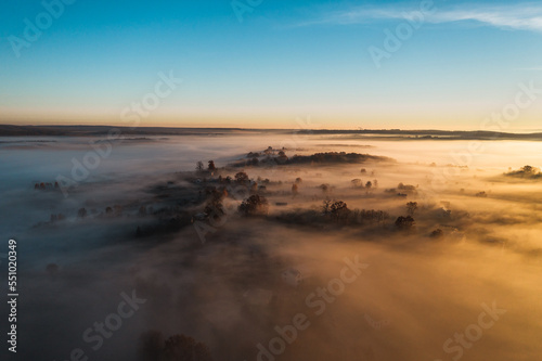Morning fog, Ukrainian village covered with fog, drone view, aerial photography