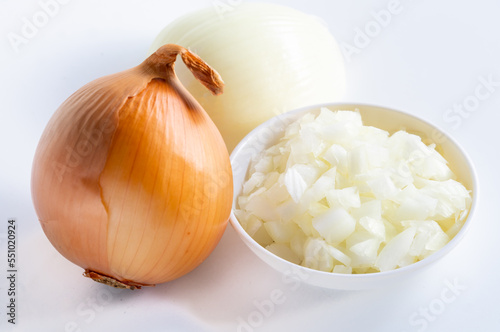 Orange onions and white onions sliced ​​ready for use in cooking placed in a plate on a white background.
