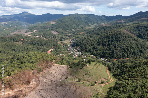 High angle view of a northern rural village in the valley Ban Thung Ton Ngio,  Mae Tuen, Omkoi district, Chiang Mai, Thailand. photo