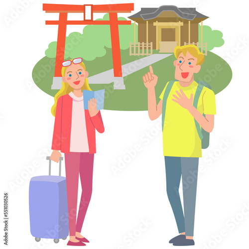 ガイドブックを手に神社を見る外国人観光客の男女