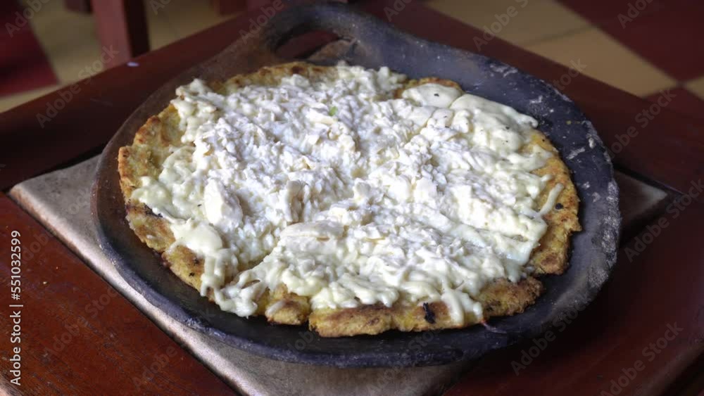 Arepa is a type of food made of ground maize dough stuffed with a ...