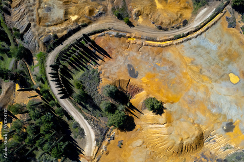 Drone aerial of copper mine with red toxic contaminated land. Environmental pollution nature contamination photo