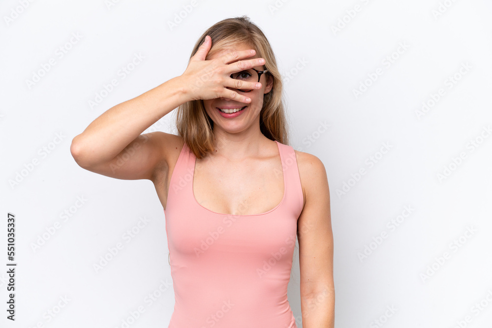 Young caucasian woman isolated on white background covering eyes by hands and smiling Young caucasian woman isolated on white background covering eyes by hands and smiling