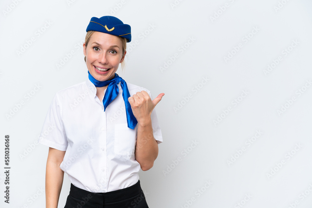 Airplane blonde stewardess woman isolated on white background pointing to the side to present a product Airplane blonde stewardess woman isolated on white background pointing to the side to present a product
