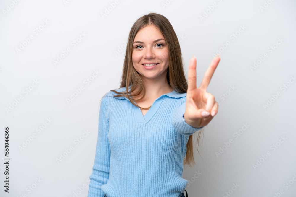 Young Lithuanian woman isolated on white background smiling and showing victory sign Young Lithuanian woman isolated on white background smiling and showing victory sign