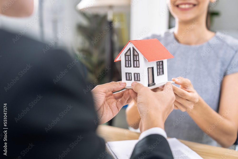 Real estate agents send clients models of houses and house keys, Making insurance or signing a real estate loan purchase agreement. Real estate agents send clients models of houses and house keys, Making insurance or signing a real estate loan purchase agreement.