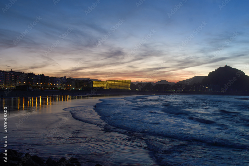 Dusk in San Sebastian from Zurriola beach, with the Kursal in the background