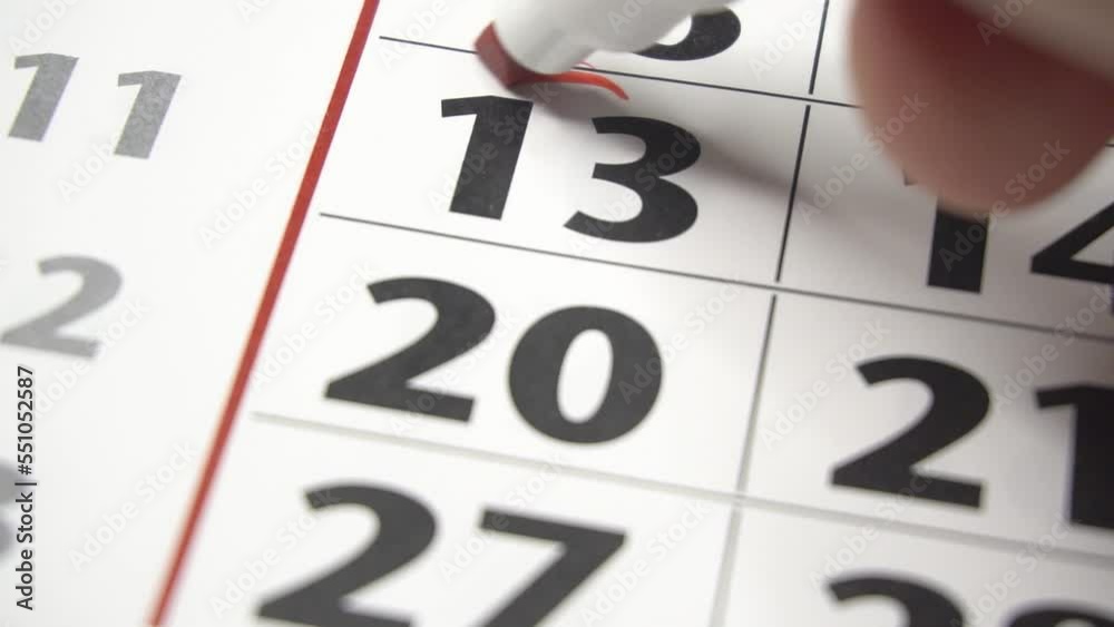 The calendar 20th day of the month is circled. A red marker circles the twentieth day of the month from the paper calendar. A very important date in the calendar The calendar 20th day of the month is circled. A red marker circles the twentieth day of the month from the paper calendar. A very important date in the calendar