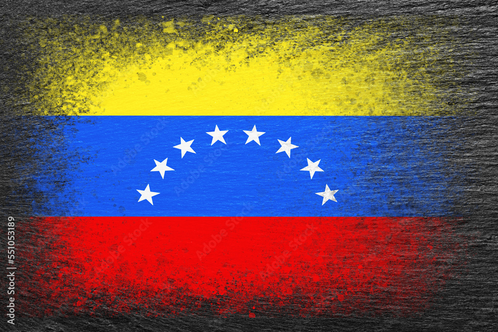 Flag of Venezuela. Flag is painted on black slate stone. Stone background. Copy space. Textured background
