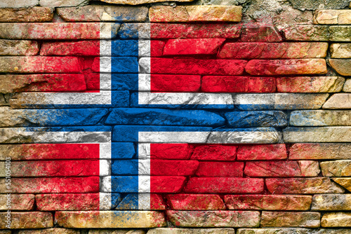Flag of Norway. Flag is painted on a stone wall. Stone background. Copy space. Textured background