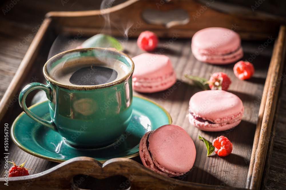 Tasty pink macaroons made of fresh raspberries.