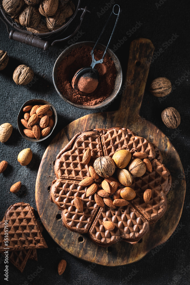 Delicious and sweet waffles with nuts and chocolate. Delicious and sweet waffles with nuts and chocolate.