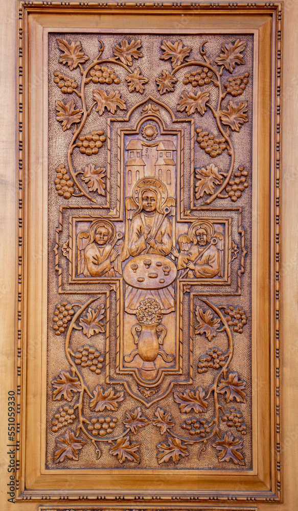 A wooden sculpture with floral motifs at the Reghin Orthodox Church - Romania