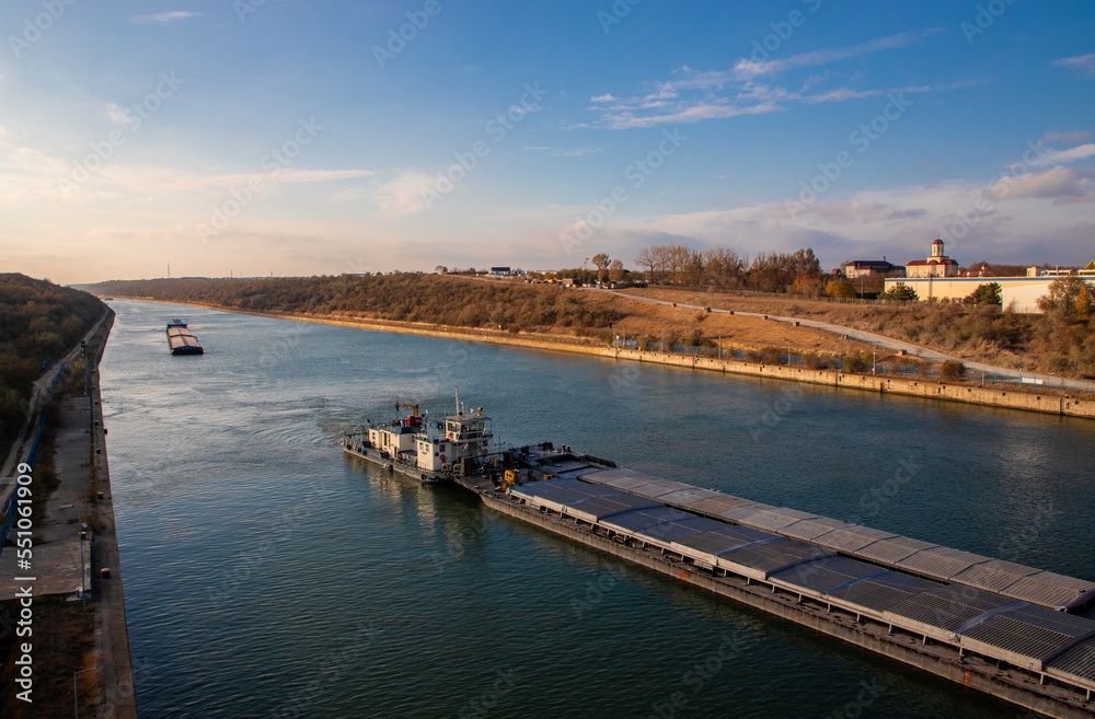 Many barges on the Danube - Black Sea canal in Romania