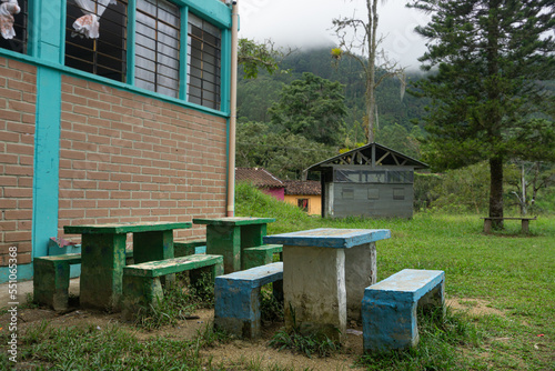 4 kitsch benches and tables, made of concrete, alone, abandoned
