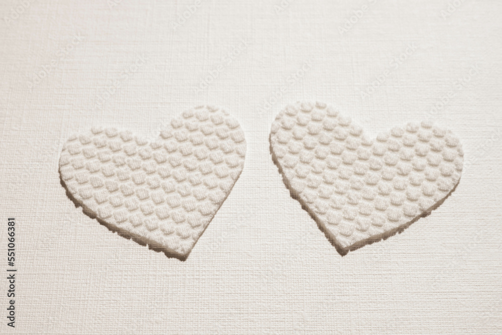 cute pink heart made of textured material on table cute pink heart made of textured material on table