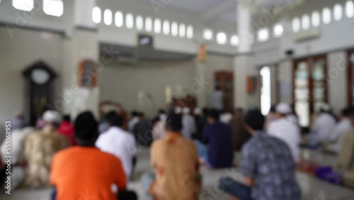 Blurry background islamic men pray in mosque in Friday. gathering in mosque. photo