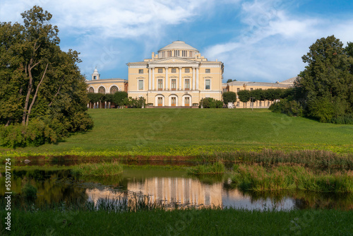 View of the Summer Palace of Emperor Paul I in Pavlovsky park from the Slavyanka River on a sunny summer day, Pavlovsk, Saint Petersburg, Russia
