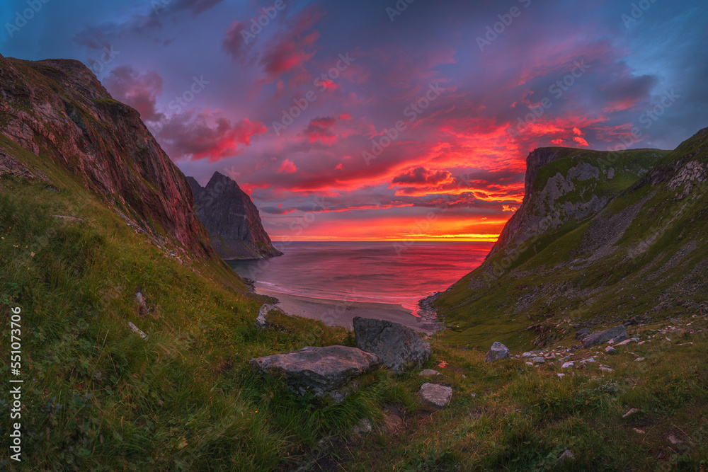spectacular sunset at kvalvika beach on the lofoten islands, norway