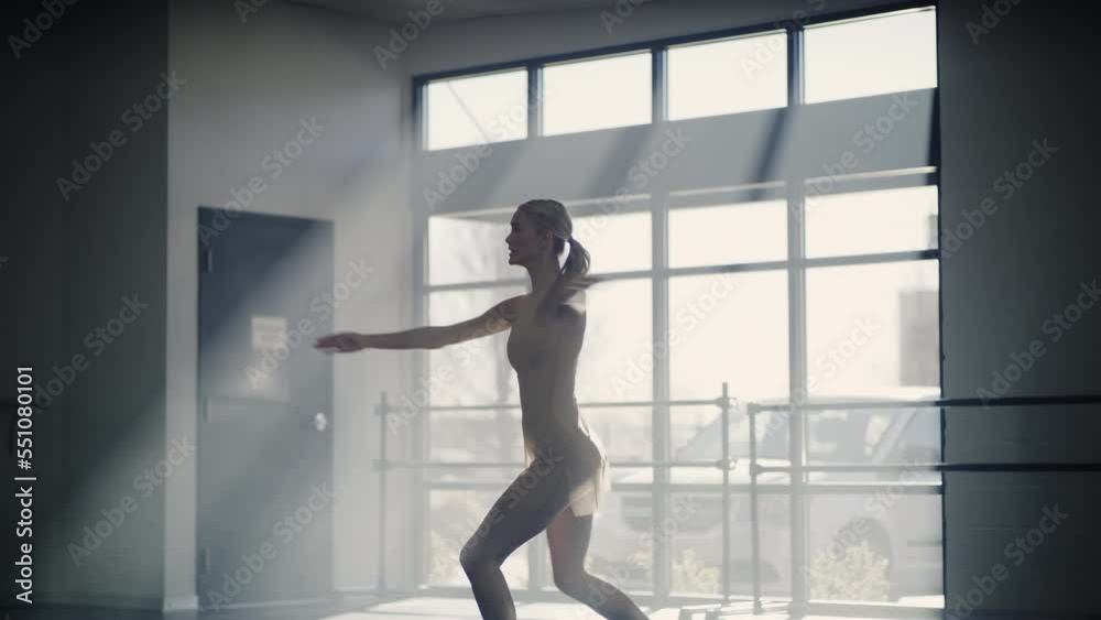 Woman practicing contemporary dancing in dance studio / Lehi, Utah, United States Woman practicing contemporary dancing in dance studio / Lehi, Utah, United States