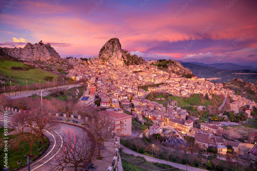 Caltabellotta, Sicily, Italy. Cityscape image if historic town Caltabellotta in Sicily at dramatic sunset.