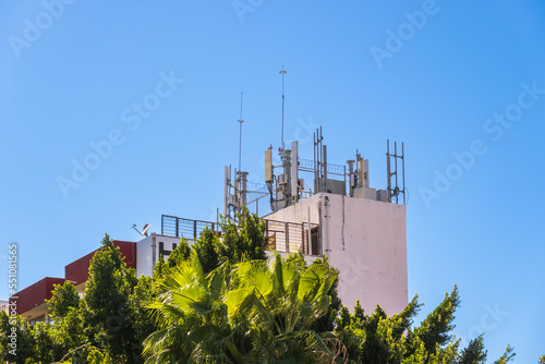 Cell phone transmission systems on the roof of an apartment building  in La Paz, Baja de California Sur, Mexico