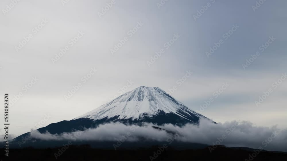 Timelapse view of Mount Fuji on a cloudy winter day, Yamanashi Prefecture, Japan Timelapse view of Mount Fuji on a cloudy winter day, Yamanashi Prefecture, Japan