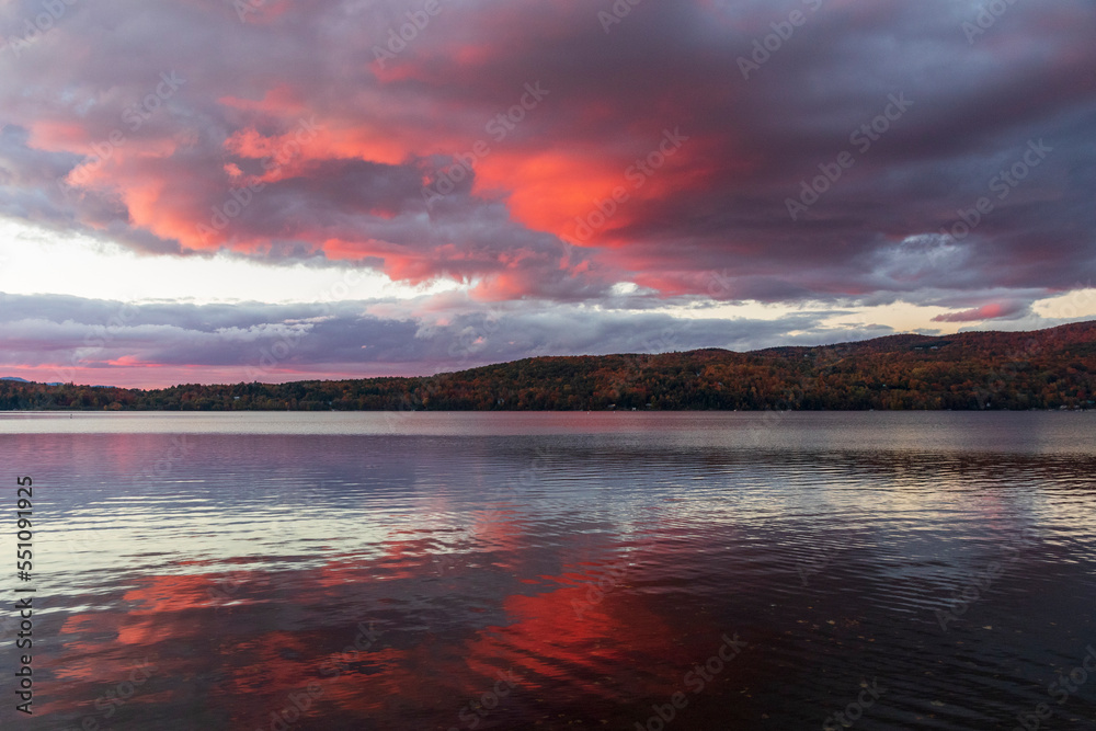 Colored clouds at sunset over  Massawippi lake in Canada