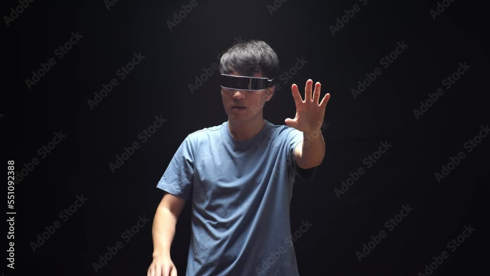 Asian Man Touching And Swiping Virtual Reality With Hand While Using Futuristic Goggles. Playing Metaverse Game
Asian Man Touching And Swiping Virtual Reality With Hand While Using Futuristic Goggles. Playing Metaverse Game