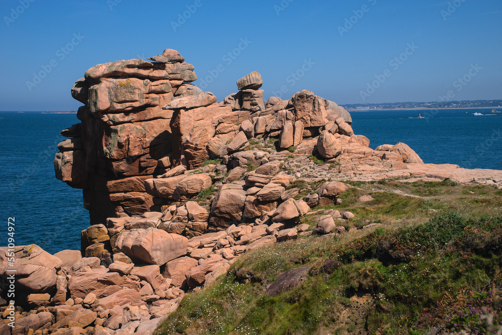 Monolithic blocks of pink granite in the Cotes d'Armor in Brittany, France. Pink granite coast