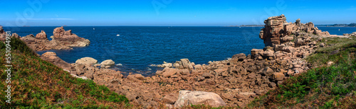 Monolithic blocks of pink granite in the Cotes d'Armor in Brittany, France. Pink granite coast
