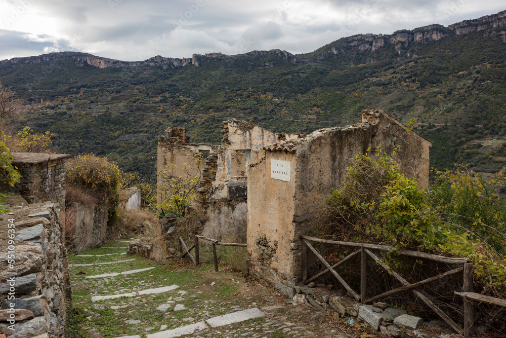 aerial view of Gairo Vecchio, an abandoned mountain village in the mountains of Sardinia, Italy; from a drone aerial view of Gairo Vecchio, an abandoned mountain village in the mountains of Sardinia, Italy; from a drone