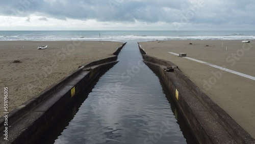 La foce del fosso Fiumetto a Marina di Pietrasanta, in Versilia, Lucca  photo