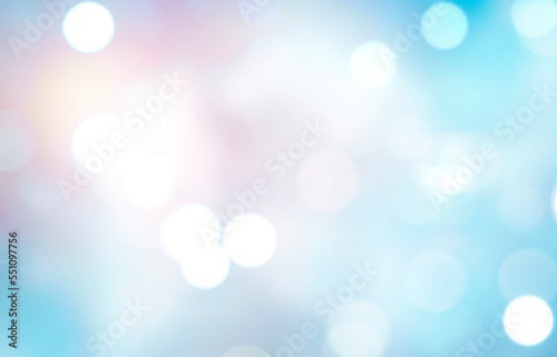 Winter blue bokeh background, abstract lights.
