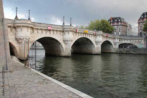 river seine and conti quay in paris (france) photo