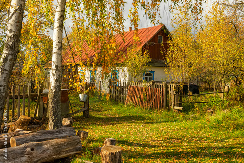 Rustic simple house in autumn sometimes. Ukraine.