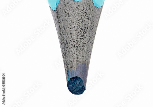 The broken tip of a pastel opal blue paint or pencil