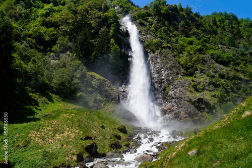 breathtaking Parcines waterfall in the lush green Italian Alps in Parcines (or Partschins) in the Rabla (or Rabland), Tel region (Merano, South Tyrol, Italy)