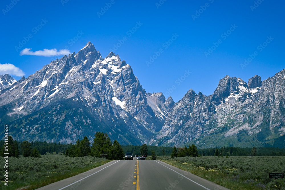 road in the mountains to Grand Teton National Park road in the mountains to Grand Teton National Park