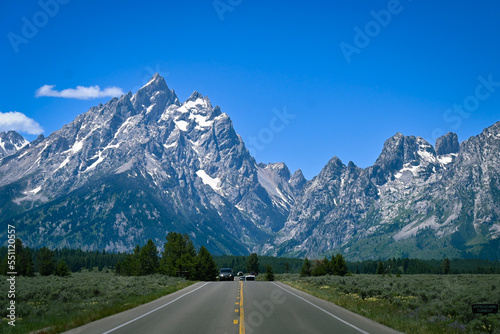 road in the mountains to Grand Teton National Park