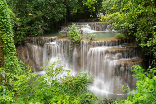 Erawan Waterfall. Nature landscape of Kanchanaburi district in natural area. it is located in Thailand for travel trip on holiday and vacation background, tourist attraction. © tampatra