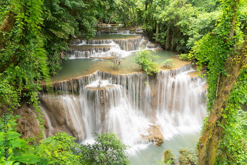 Erawan Waterfall. Nature landscape of Kanchanaburi district in natural area. it is located in Thailand for travel trip on holiday and vacation background, tourist attraction.