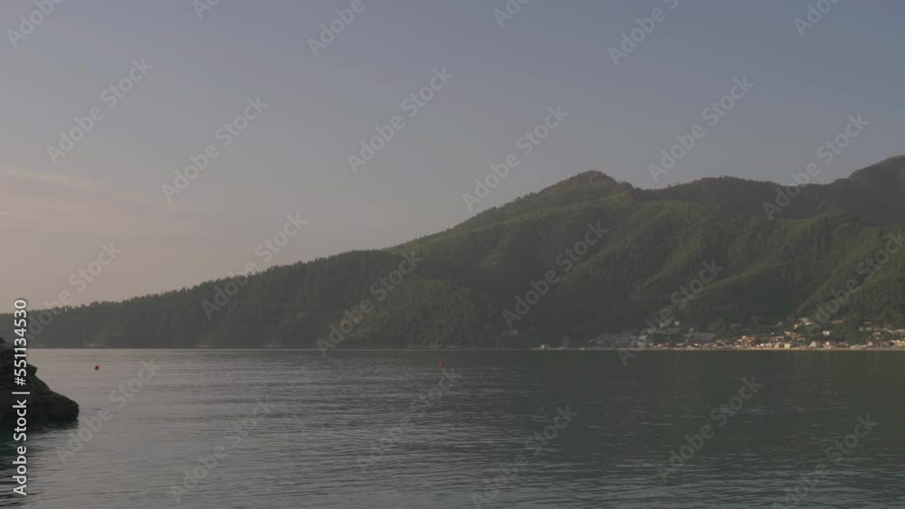 Panning view of Golden Beach and Ipsarion Mountain in Thassos Island, Greece Panning view of Golden Beach and Ipsarion Mountain in Thassos Island, Greece