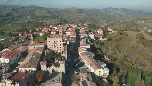 aerial view 4k 24 fps of the medieval village of Tavoleto in the province of Pesaro Urbino Marche region Italy
 photo