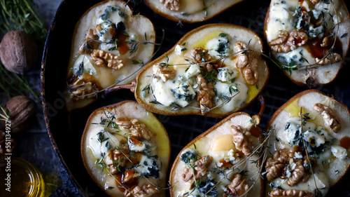 Bilde på lerret Baked pears with dor blue cheese, honey, thyme and walnuts