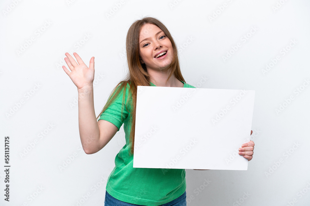 Young caucasian woman isolated on white background holding an empty placard and saluting Young caucasian woman isolated on white background holding an empty placard and saluting