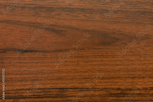 Texture of brown laminated chipboard for furniture. Top view background