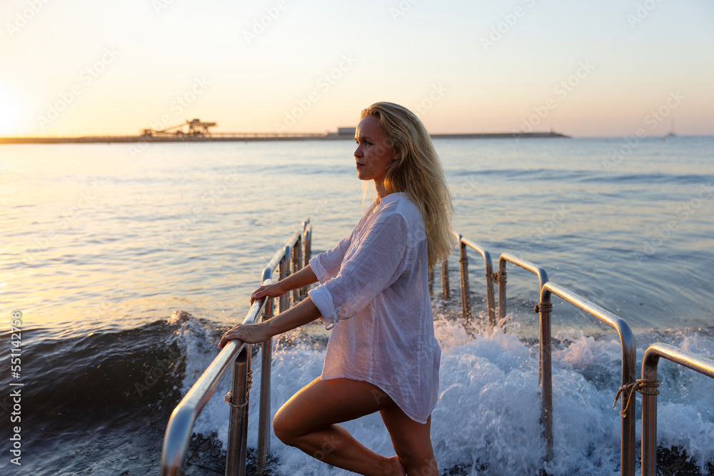 Portrait of a pretty woman on the sea Portrait of a pretty woman on the sea