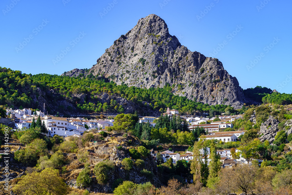 Village of white houses at the foot of the great mountain, in the south of Spain, Grazalema, Cadiz.